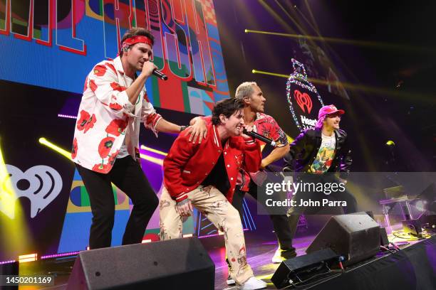 James Maslow, Logan Henderson, Carlos PenaVega and Kendall Schmidt of Big Time Rush performs onstage at iHeartRadio Y100’s Jingle Ball 2022 Presented...