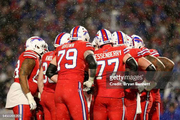 Buffalo Bills offense huddles during the fourth quarter against the Miami Dolphins at Highmark Stadium on December 17, 2022 in Orchard Park, New York.