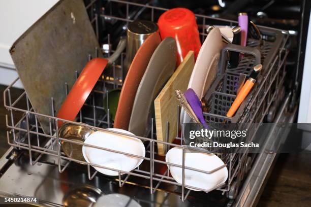 dishwasher appliance with clean dishes - dirty pan stock pictures, royalty-free photos & images
