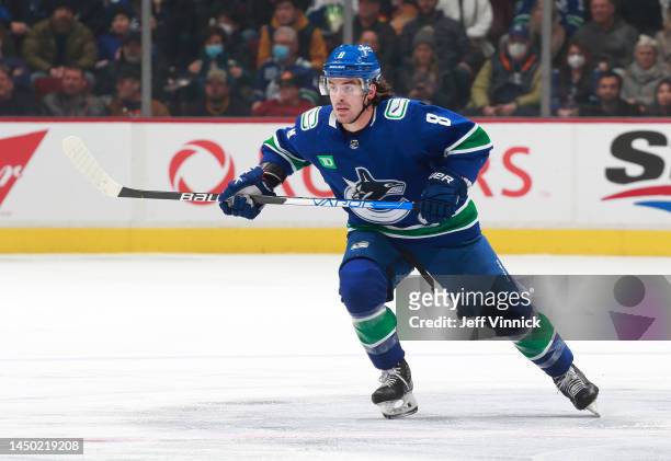 Conor Garland of the Vancouver Canucks skates up ice during their NHL game against the Winnipeg Jets at Rogers Arena December 17, 2022 in Vancouver,...