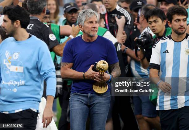 Jorge Messi, father and agent of Lionel Messi - holding his son's trophy of 'Best player of the World Cup - following the FIFA World Cup Qatar 2022...