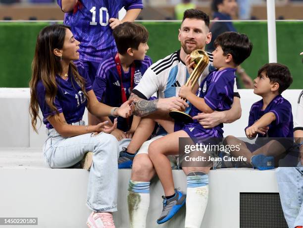 Lionel Messi of Argentina with his wife Antonella Roccuzzo and their sons celebrate following the FIFA World Cup Qatar 2022 Final match between...