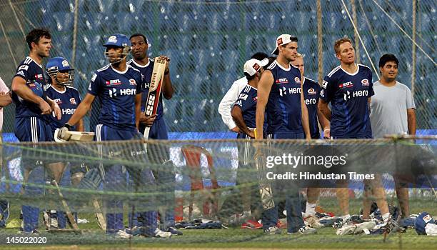 Mumbai Indians players along with Anant Ambani , son of Mukesh Ambani and owner of Mumbai Indians during the team practice session at M Chinnaswamy...