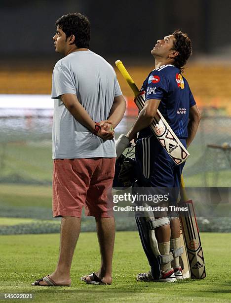 Mumbai Indians Batsman Sachin Tendulkar with Anant Ambani, son of Mukesh Ambani and owner of Mumbai Indians during the team practice session at M...