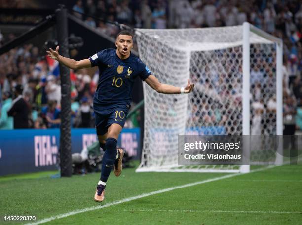 Kylian Mbappe of France celebrates scoring their third goal during the FIFA World Cup Qatar 2022 Final match between Argentina and France at Lusail...