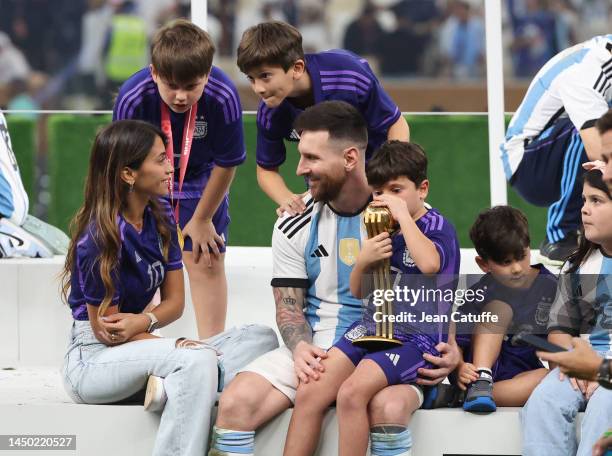 Lionel Messi of Argentina with his wife Antonella Roccuzzo and their sons celebrate following the FIFA World Cup Qatar 2022 Final match between...