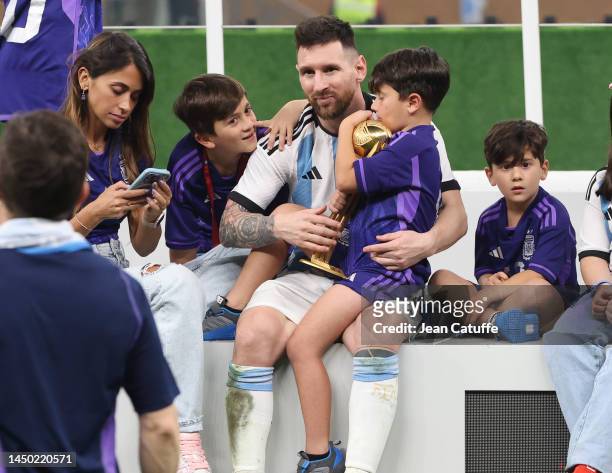 Lionel Messi of Argentina with his wife Antonella Roccuzzo and their sons celebrate following the FIFA World Cup Qatar 2022 Final match between...