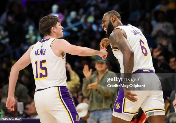 Austin Reaves and LeBron James of the Los Angeles Lakers celebrate their point in the first half against the Washington Wizards at Crypto.com Arena...