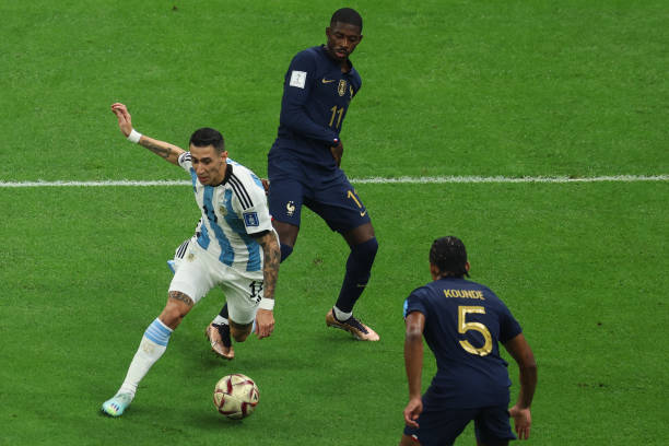 Angel Di Maria of Argentina is fouled by Ousmane Dembele of France which leads to a penalty to Argentina during the FIFA World Cup Qatar 2022 Final...