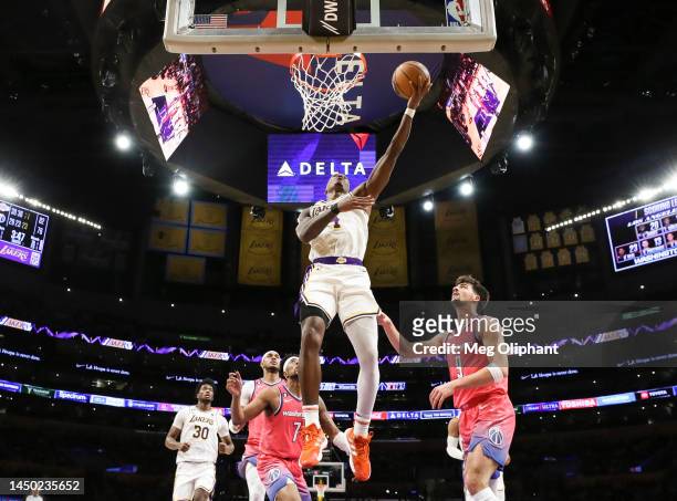 Lonnie Walker IV of the Los Angeles Lakers drives to the basket against the Washington Wizards at Crypto.com Arena on December 18, 2022 in Los...