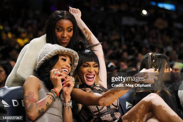 Coi Leray, Jackie Aina, and model Winnie Harlow attend the game between the Los Angeles Lakers and the Washington Wizards at Crypto.com Arena on...