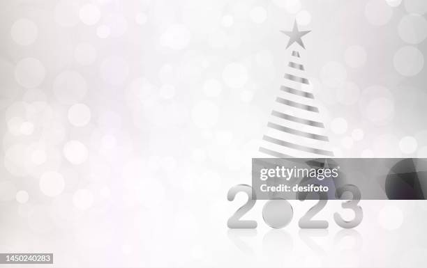silver white metallic light grey colored three dimensional or 3d text 2023 for happy new year festive glowing glittering horizontal vector backgrounds with a striped christmas tree with a star and copy space - string lights white background stock illustrations