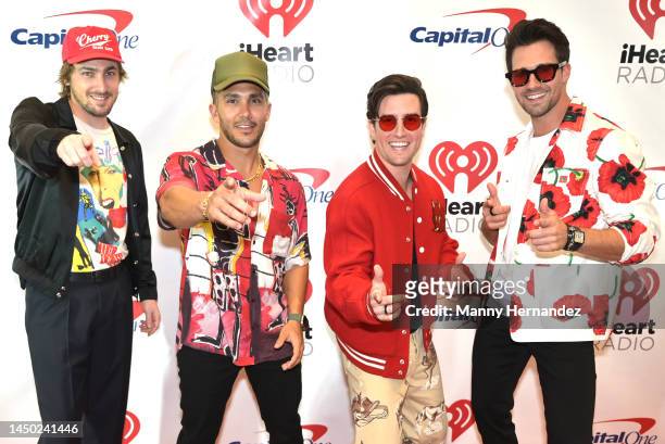 Kendall Schmidt, Carlos Pena, Jr., Logan Henderson and James Maslow, members of Big Time Rush, attend the iHeartRadio Jingle Ball 2022 presented by...