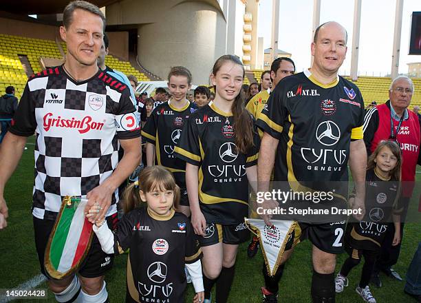 Michael Shumacher Formula One driver arrive with Princess Alexandra and Prince Albert II at World Stars Match MC on May 22, 2012 in Monaco, Monaco.