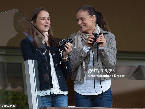 Pauline Ducruet and her mother Princess Stephanie look at the players at World Stars Match MC on May 22, 2012 in Monaco, Monaco.
