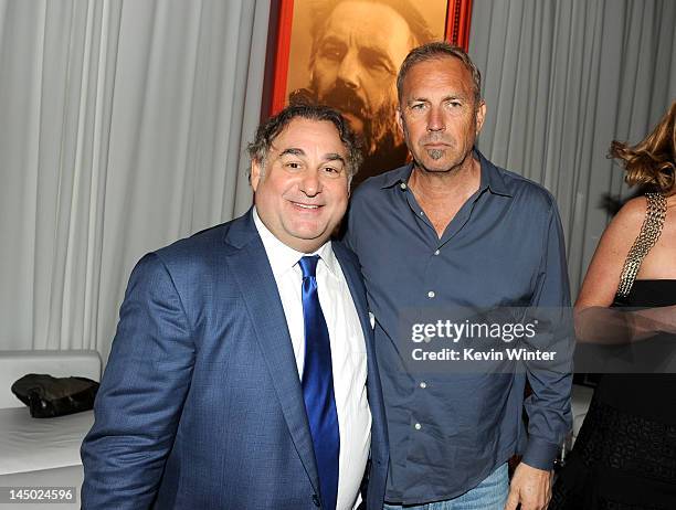 Producer Leslie Greif and actor/Producer Kevin Costner attend The Hollywood Reporter & The History Channel Screening Of "Hatfields & McCoys" at Milk...