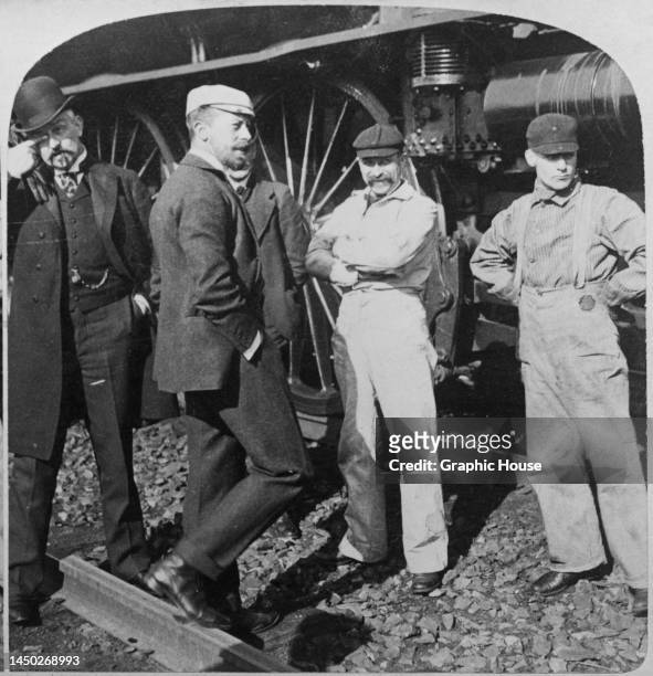 German Royal Prince Henry of Prussia with unspecified people as he is about to board a locomotive for a ride through the Allegheny Mountains in...