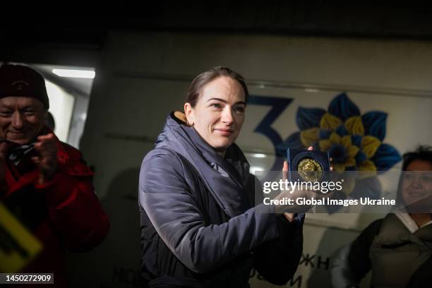 Oleksandra Matviichuk, head of the Center for Civil Liberties awarded this year’s with the Nobel Peace Prize, holds the Nobel medal at the Kyiv...