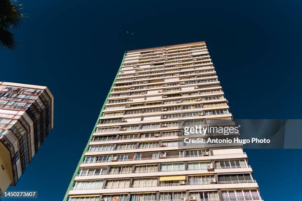 large residential building in the city of benidorm, alicante. - benidorm stock pictures, royalty-free photos & images