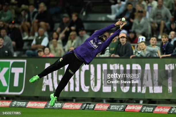 Shadab Khan of the Hurricanes attempts a catch during the Men's Big Bash League match between the Hobart Hurricanes and the Perth Scorchers at...