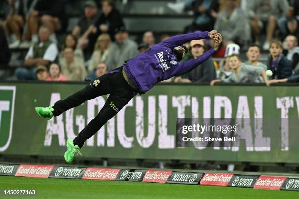 Shadab Khan of the Hurricanes attempts a catch during the Men's Big Bash League match between the Hobart Hurricanes and the Perth Scorchers at...