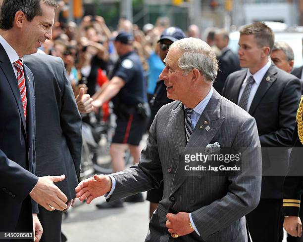 Prince Charles, Prince of Wales and the Premier of Ontario, the Honourable Dalton McGuinty, arrive at the Digital Media Zone for a presentation, as...