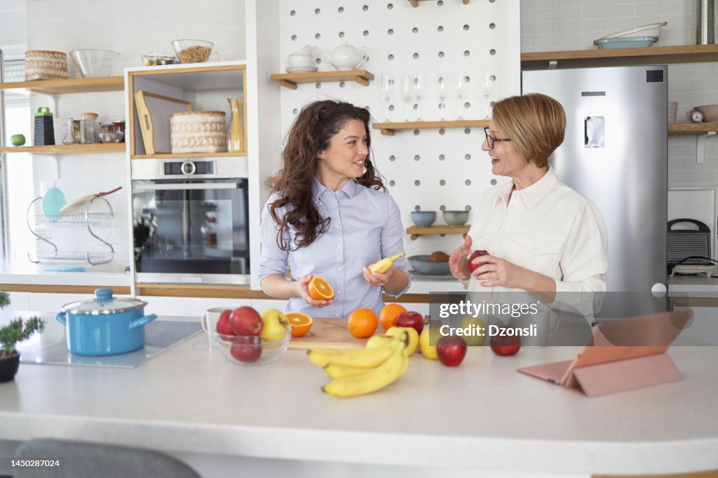 Kitchen Fun Mother And Daughter Having Fun In The Kitchen High-Res Stock Photo ...