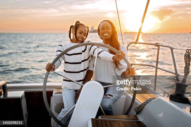 let's sail together - wealthy family stock pictures, royalty-free photos & images