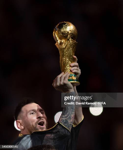Lionel Messi of Argentina lifts the FIFA World Cup Qatar 2022 Winner's Trophy during the FIFA World Cup Qatar 2022 Final match between Argentina and...