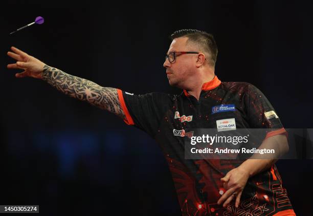 Robert Owen of Wales in action on Day Five of the Cazoo World Darts Championship at Alexandra Palace on December 19, 2022 in London, England.