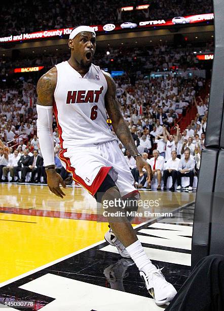 LeBron James of the Miami Heat reacts after dunking during Game Five of the Eastern Conference Semifinals in the 2012 NBA Playoffs against the...