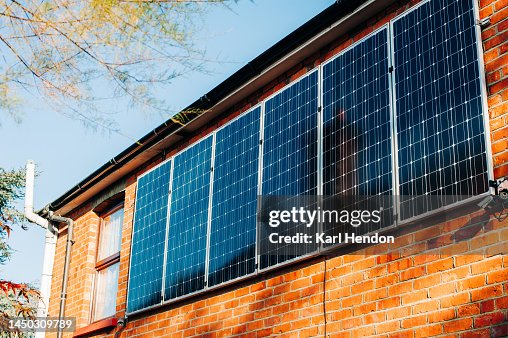 Solar Panel Reverse Side Vertical Solar Panels On The Side Of A House High-Res Stock Photo ...