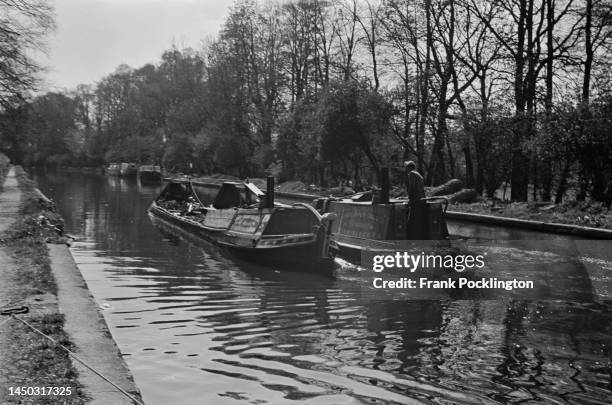 Two barges side by side travel along the Grand Union Canal, England. Picture Post - 7798 - The Scandal of our Waterways - Volume 67 Issue 13 - pub....