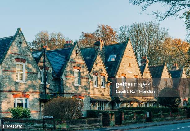 houses at sunset - woking stock pictures, royalty-free photos & images