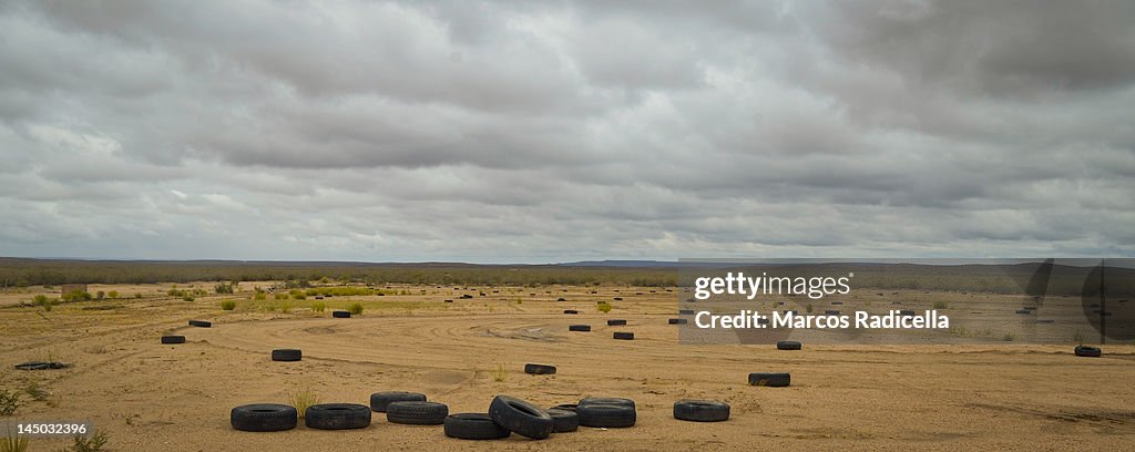 Car tires on landscape