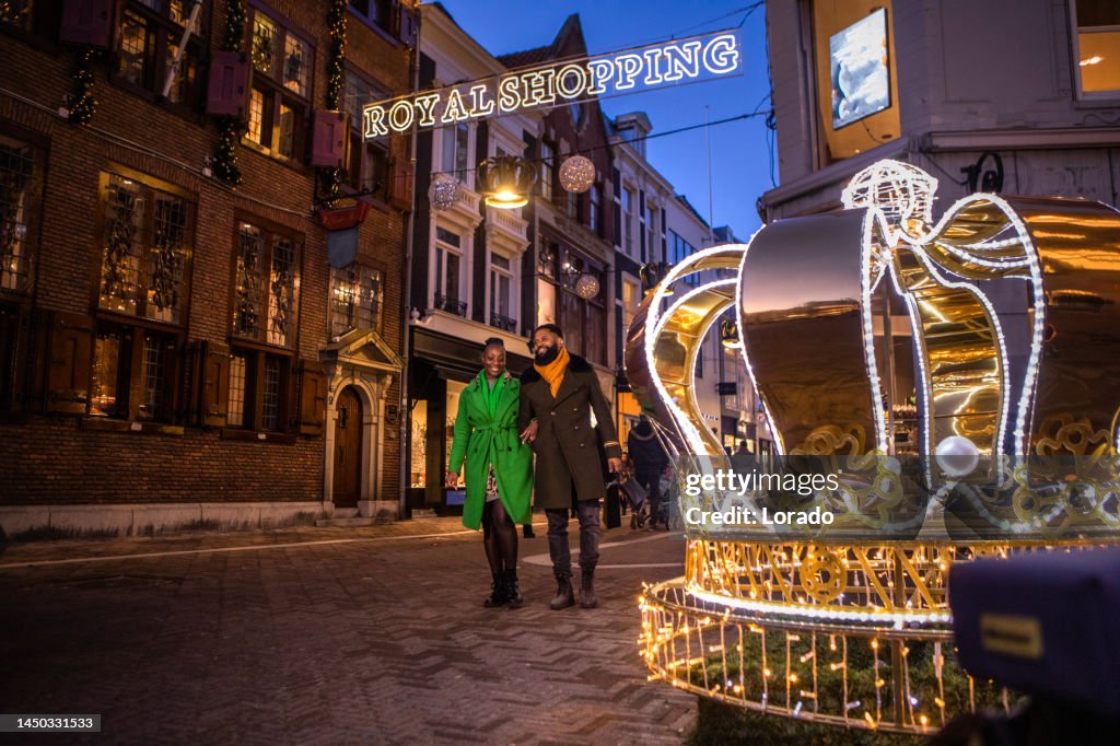A beautiful black couple at Christmas winter shopping in the Hague