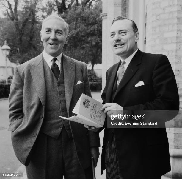 Henry Brooke , Chief Secretary to the Treasury, and Enoch Powell , Minister of Health, standing outside the Brighton Dome in Sussex for the 13th...