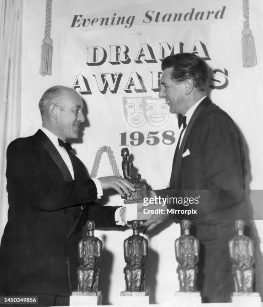 Michael Redgrave receiving the 1958 Best Actor award from Alec Guinness at the Evening Standard Theatre Awards. 27th January 1959.