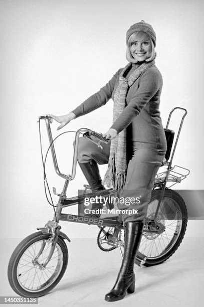 Ann Aston seen here in the studio modelling the new Chopper bikecirca 1975.