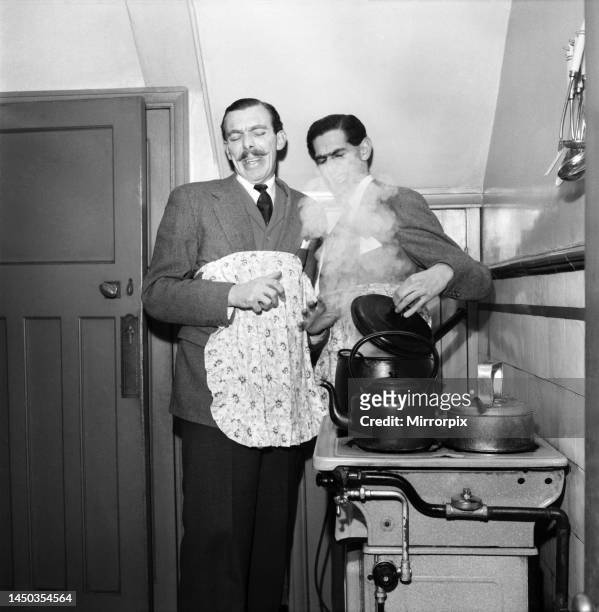Comedy scriptwriters Frank Muir and Denis Norden. December 1952.