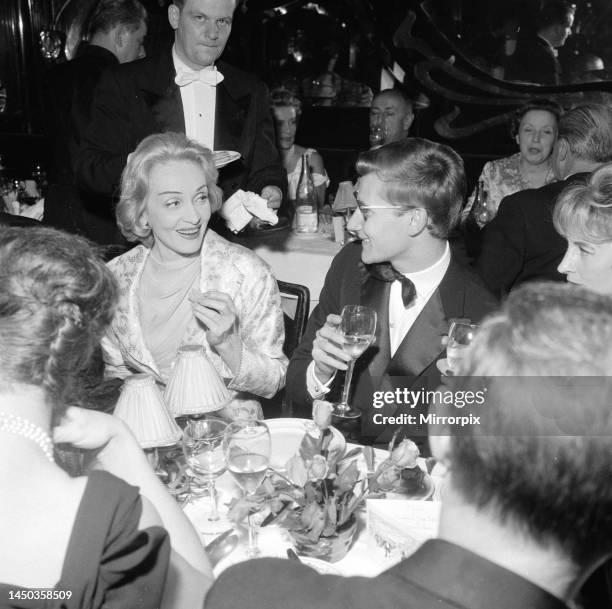 Marlene Dietrich with Yves Saint Laurent in Paris. November 1959.