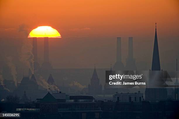 silhouettes of chimneys and spires - battersea power station silhouette stock pictures, royalty-free photos & images