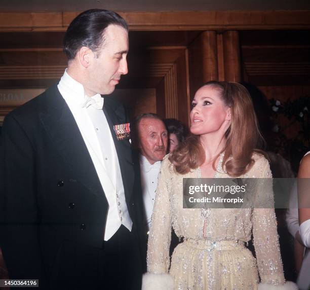 Christopher Lee & Ursula Andress arriving at the premiere of Born Free. 14th March 1966.