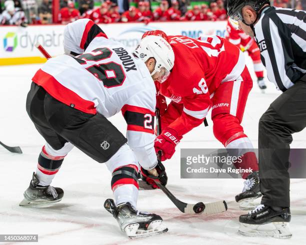 Claude Giroux of the Ottawa Senators wins a face off against Andrew Copp of the Detroit Red Wings during the first period of an NHL game at Little...