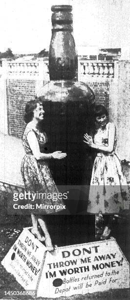 This giant bottle, 10ft high, dwarfs the two pretty girls from Barry. It's real reason is to remind visitors of the dangers of broken bottles in the...