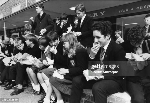 Children at St. Augustine's secondary school in Hugton, eat sandwiches, fish and chips during school meals disputes. September 1967.