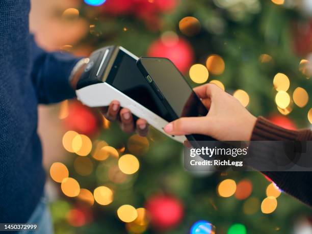 contactless payment system - company christmas at pops stock pictures, royalty-free photos & images