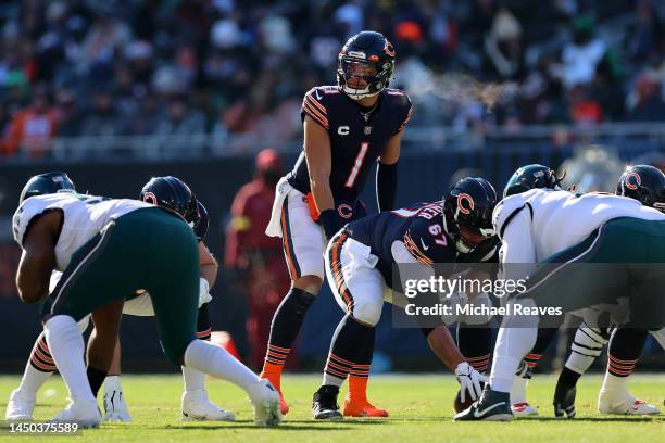Justin Fields of the Chicago Bears looks on under center against the Philadelphia Eagles during the first quarter at Soldier Field on December 18,...