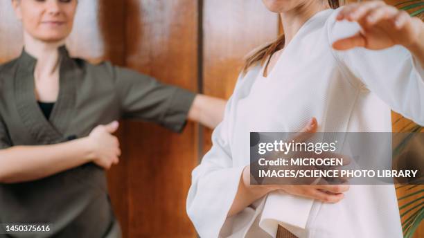 eft finger tapping technique - spleen stock pictures, royalty-free photos & images