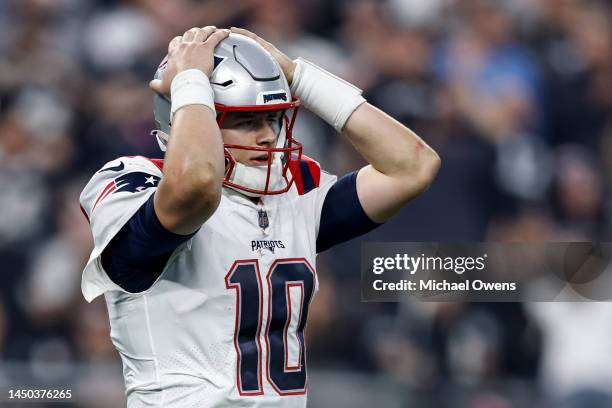 Mac Jones of the New England Patriots reacts during an NFL football game between the Las Vegas Raiders and the New England Patriots at Allegiant...